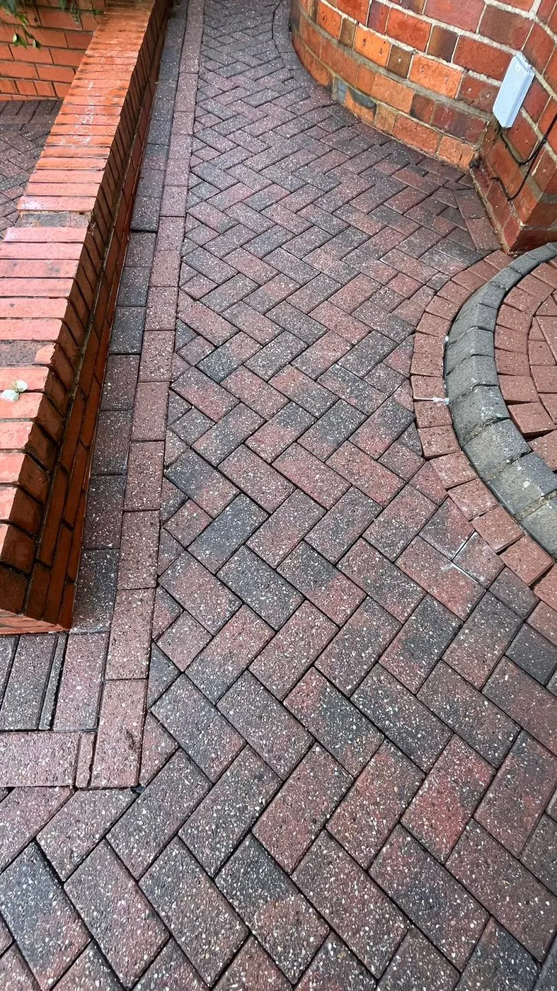 Clean path and brickwork after jet washing