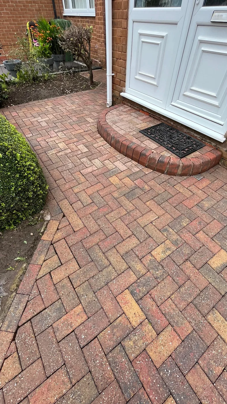 Clean block paved front path after lichen treatment